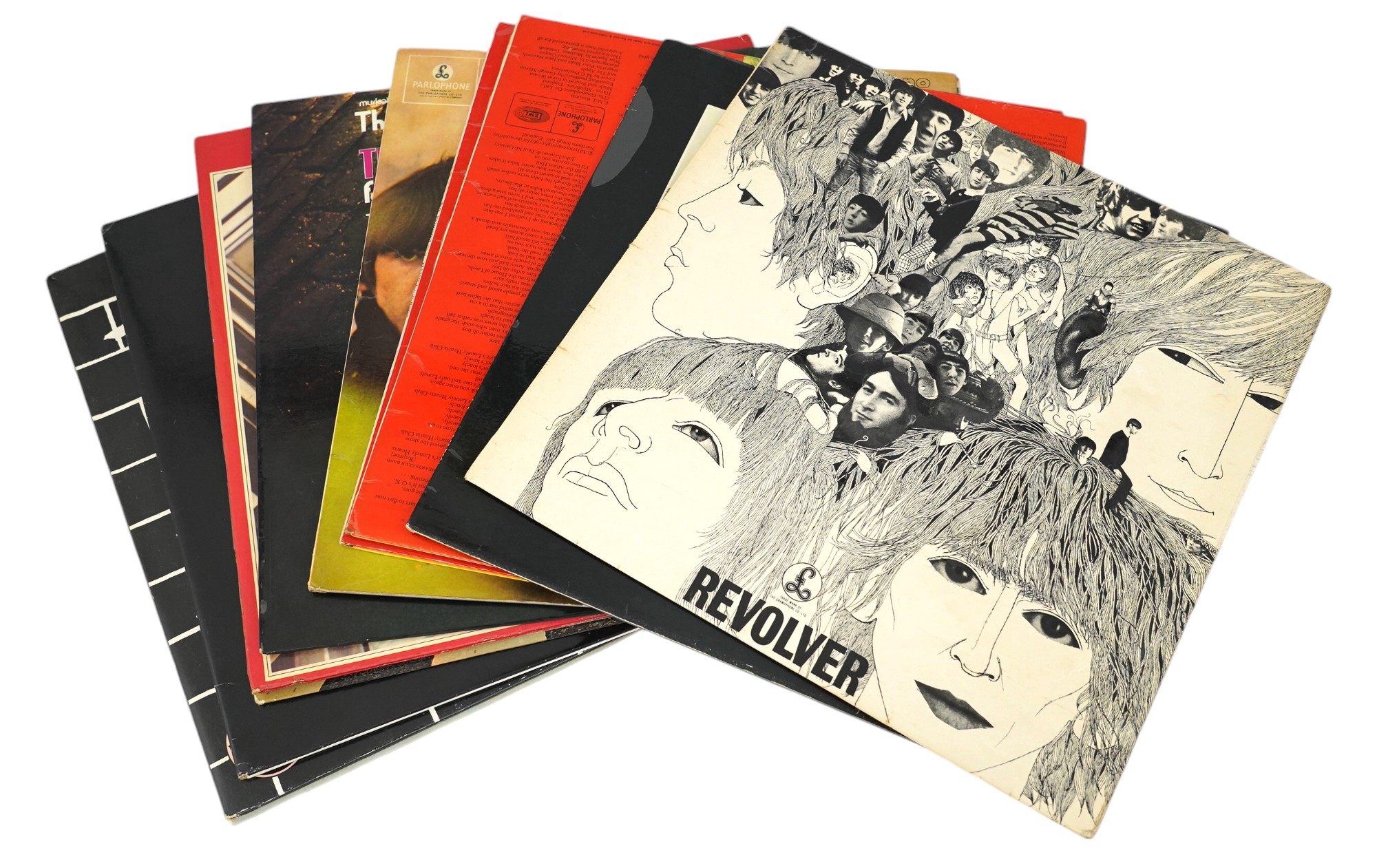 Thirteen The Beatles LP record albums including; Revolver, Let It Be, Sgt Pepper and another, Beatles For Sale, The Early Years, The Beatles 1962-1966, Abbey Road and another, 20 Greatest Hits, Greatest Hits Volume Two,